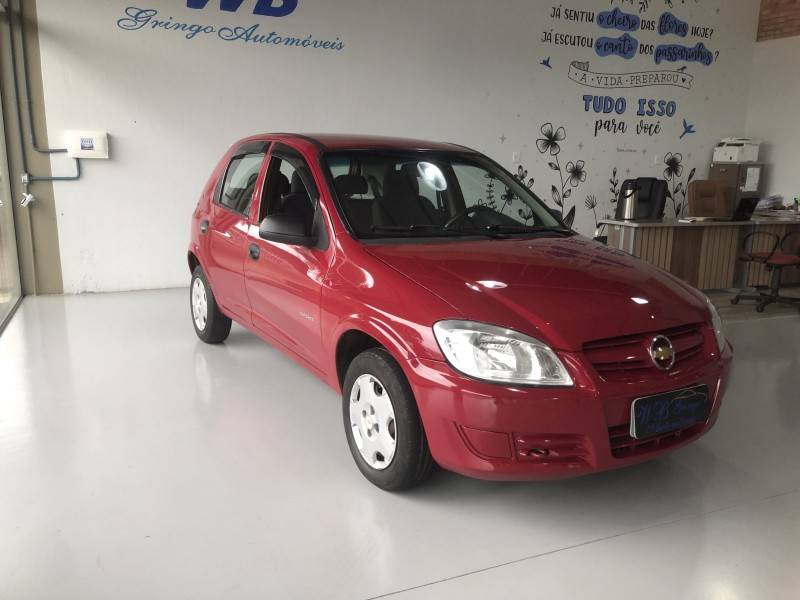 CHEVROLET - CELTA - 2009/2010 - Vermelha - R$ 27.800,00